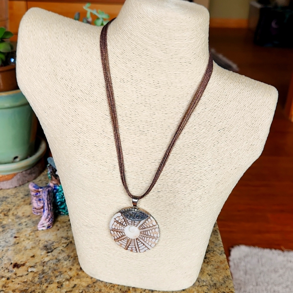A K R Shell necklace in earth tones